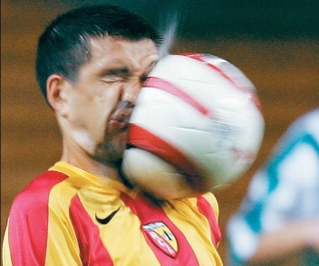soccer-man-hit-in-face-with-soccer-ball